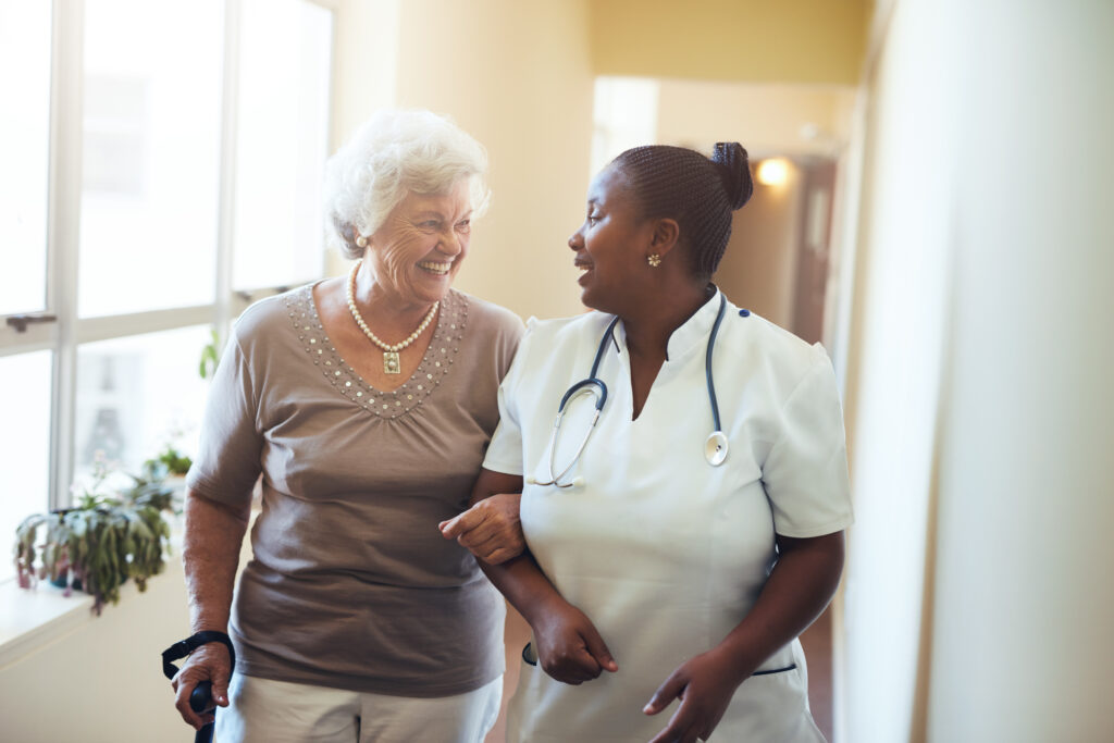 nurse assisting senior woman at nursing home 2021 08 26 19 58 15 utc
