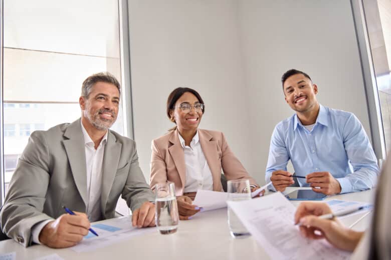 happy busy executive team diverse having business meeting, onboarding interview.