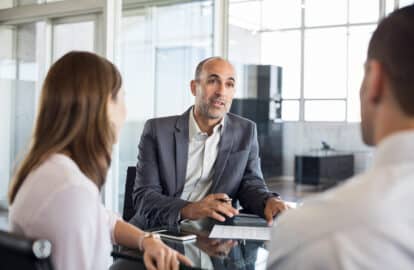 financial advisor with clients